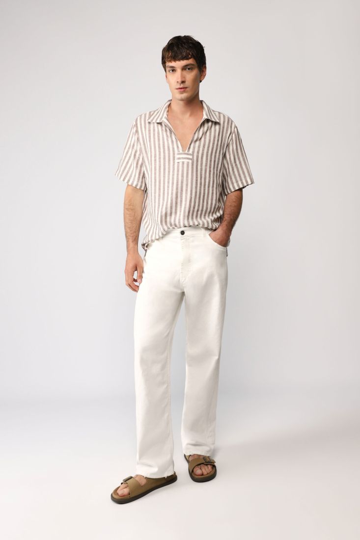 Pantaloni a palazzo monocolour con cinque tasche
