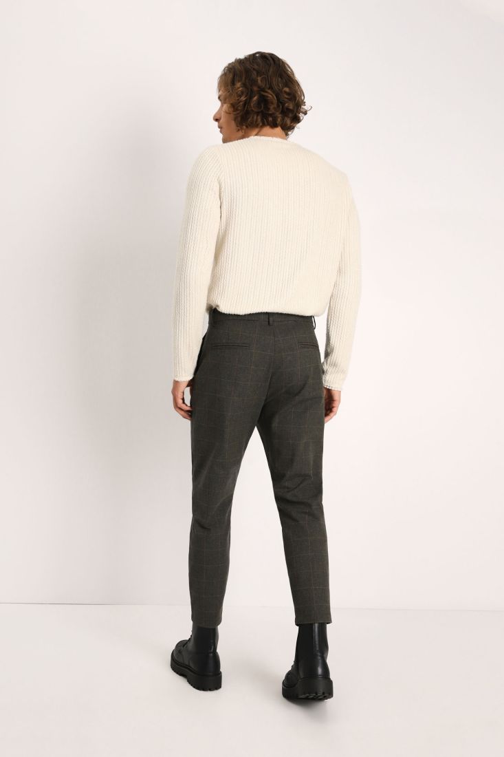 Pantaloni slim-fit a quadri con catena e pinces